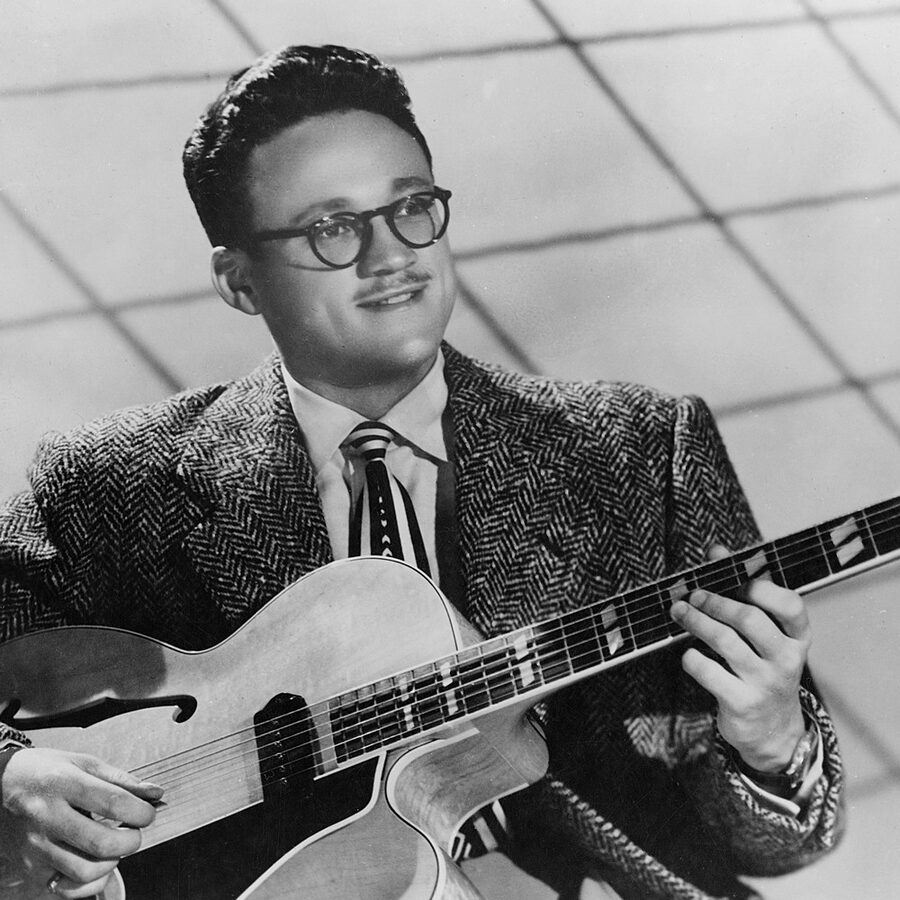 Toots Thielemans jeune, guitariste, en veste tweed, début de carrière